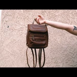 Brown leather backpack. Small, Rosetti.